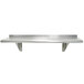A stainless steel Advance Tabco wall shelf with a shelf on top.