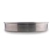 An American Metalcraft aluminum cake pan with straight sides on a silver metal surface.