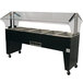 An Advance Tabco stainless steel hot food table with a clear top and black base.