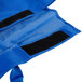 A blue Vollrath storage bag with black straps.