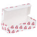 A white box with red hearts on it.