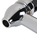 A chrome Cal-Mil faucet with a black and silver handle.
