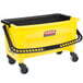 A yellow Rubbermaid mop bucket with black wringer.