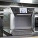A stainless steel Merrychef eikon e4s countertop oven.