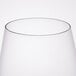 A close up of a Stolzle stemless wine glass on a white background.