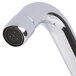 A chrome Equip by T&S wall mount faucet with a black handle.