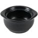 A close up of a black Hall China onion soup bowl with a lid.