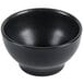 A black Hall China chili bowl on a white background.