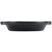 A black round Hall China au gratin dish with a handle.