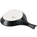 A white and black Hall China fry pan server with a white surface.