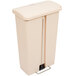 A beige plastic Rubbermaid Slim Jim rectangular trash can with a lid.
