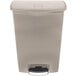 A beige Rubbermaid Slim Jim rectangular trash can with a lid and step-on handle.