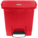 A red Rubbermaid Slim Jim step-on trash can with a red lid.