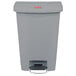 A grey Rubbermaid Slim Jim step-on trash can with a lid.