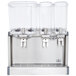 A Crathco refrigerated beverage dispenser with three clear containers.