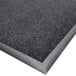 A close-up of a grey Cactus Mat carpet mat with a black border.
