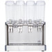 A Crathco Mini-Quad cold beverage dispenser with four clear containers.