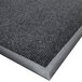 A charcoal carpet mat with a grey border.