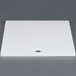 A white square ARY VacMaster filler plate with a hole.