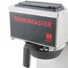A Grindmaster pour over coffee brewer on a counter.