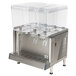A Crathco stainless steel refrigerated beverage dispenser with three clear containers on a counter.