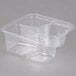 A Fabri-Kal clear plastic deli container with three compartments.