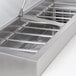 A stainless steel Avantco refrigeration pan divider bar.