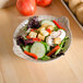 A Thunder Group Jazz melamine bowl filled with a vegetable salad on a table.