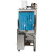 A Noble Warewashing conveyor dishwasher with blue plastic panels.