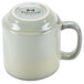 A Tuxton TuxTrendz Artisan Sagebrush mug with a white interior and handle.