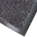A charcoal carpet entrance floor mat with a black border.