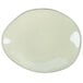 A white oval Tuxton china plate.