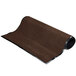 A roll of brown carpet with black trim on a white background.