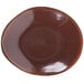 A brown TuxTrendz Artisan China plate with an elliptical shape.
