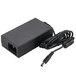 A black power adapter with a wire and a black power cord with a rectangular object.