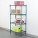 A Metroseal wire shelving unit with shelves of boxes.