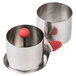 A stainless steel Ateco round mold set.