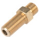 A brass threaded male connector on a metal object with a brass screw.