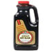 A black bottle of Kikkoman Sweet Soy Glaze with a label.