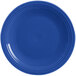 A close-up of a blue Fiesta® Dinnerware chop plate with a rim.
