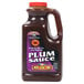 A case of four Kikkoman Plum Sauce jugs with labels.