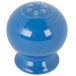 A blue Fiesta pepper shaker with holes.