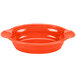 An orange oval casserole dish with handles on a white background.