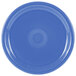 A close-up of a Fiesta® Lapis blue plate with a circular design.