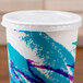 A Solo translucent plastic lid with straw slot and identification buttons on a paper cold cup.