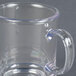 A clear Tritan mug with a handle.