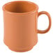 An orange GET Diamond Harvest pumpkin mug with a handle.