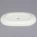 A white oval Tuxton china platter.