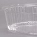 A WNA Comet clear plastic lid on a clear plastic container.