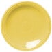 A Fiesta® Sunflower yellow bread and butter plate with a white rim.